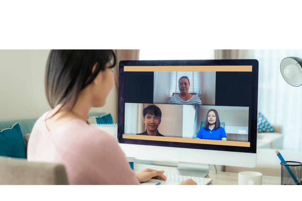 A woman on a zoom call with colleagues from home.